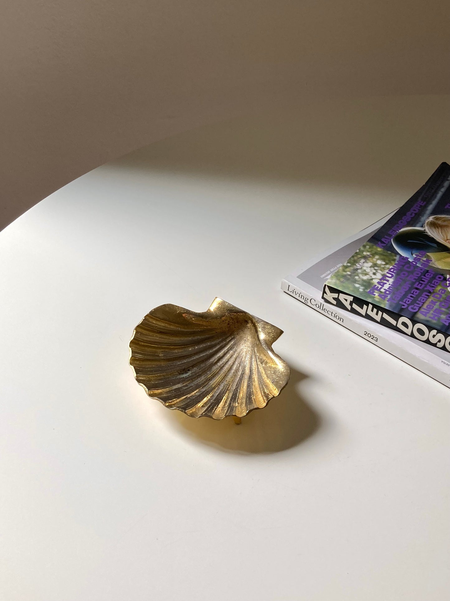 Golden shell-shaped ashtray