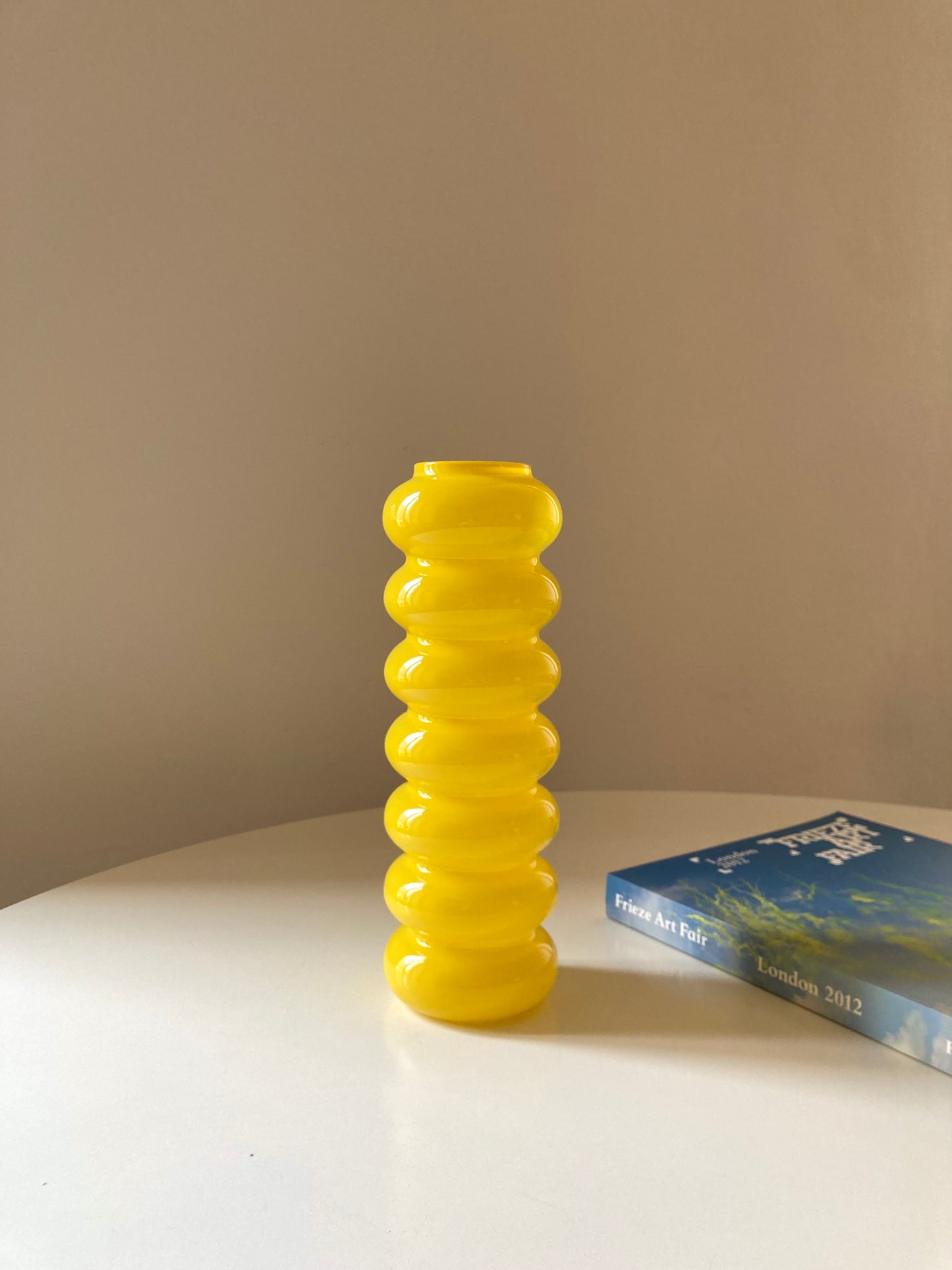 Solstrale yellow vase by Anne Nilsson