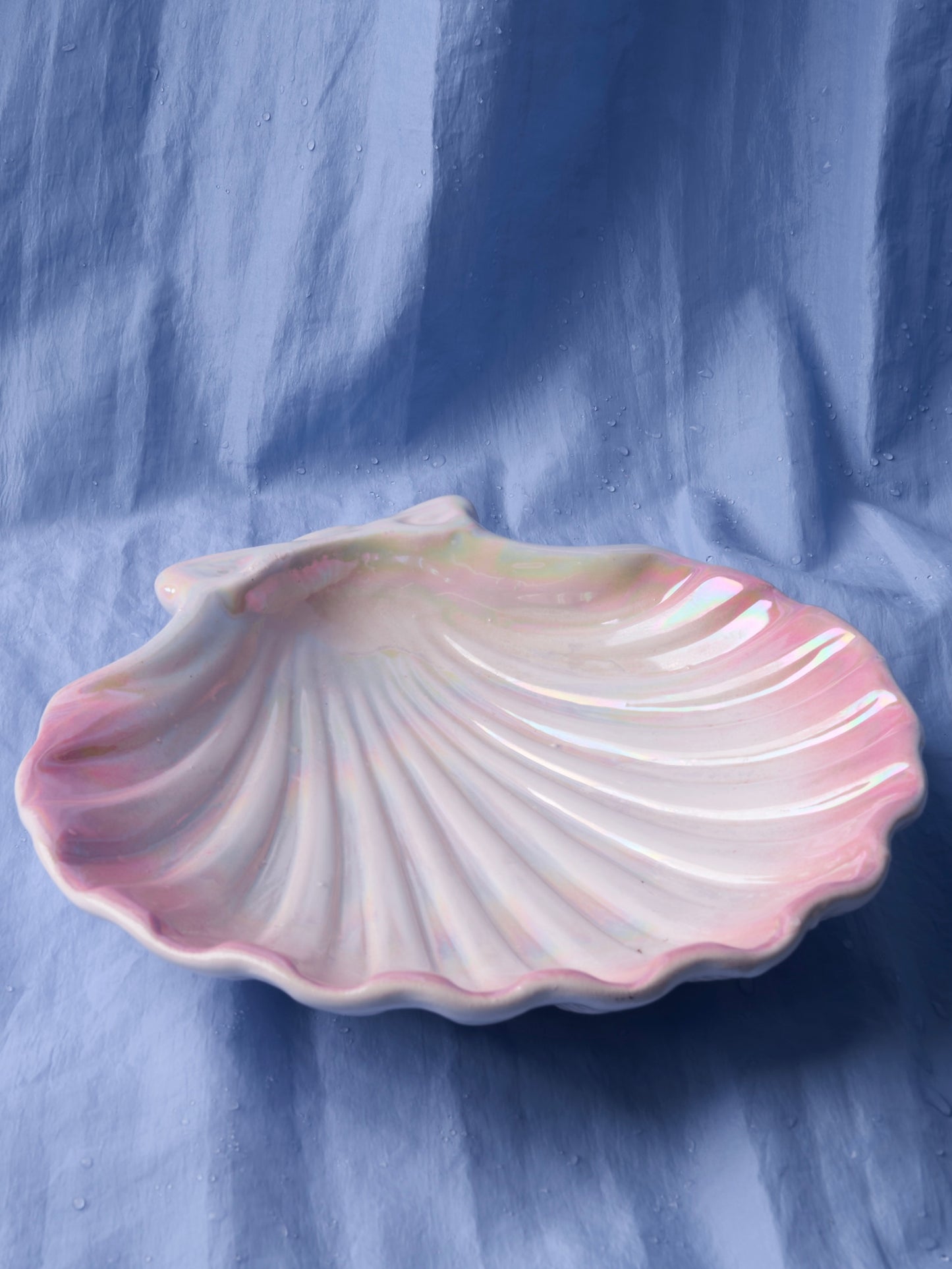 Pink and white ceramic shell plate