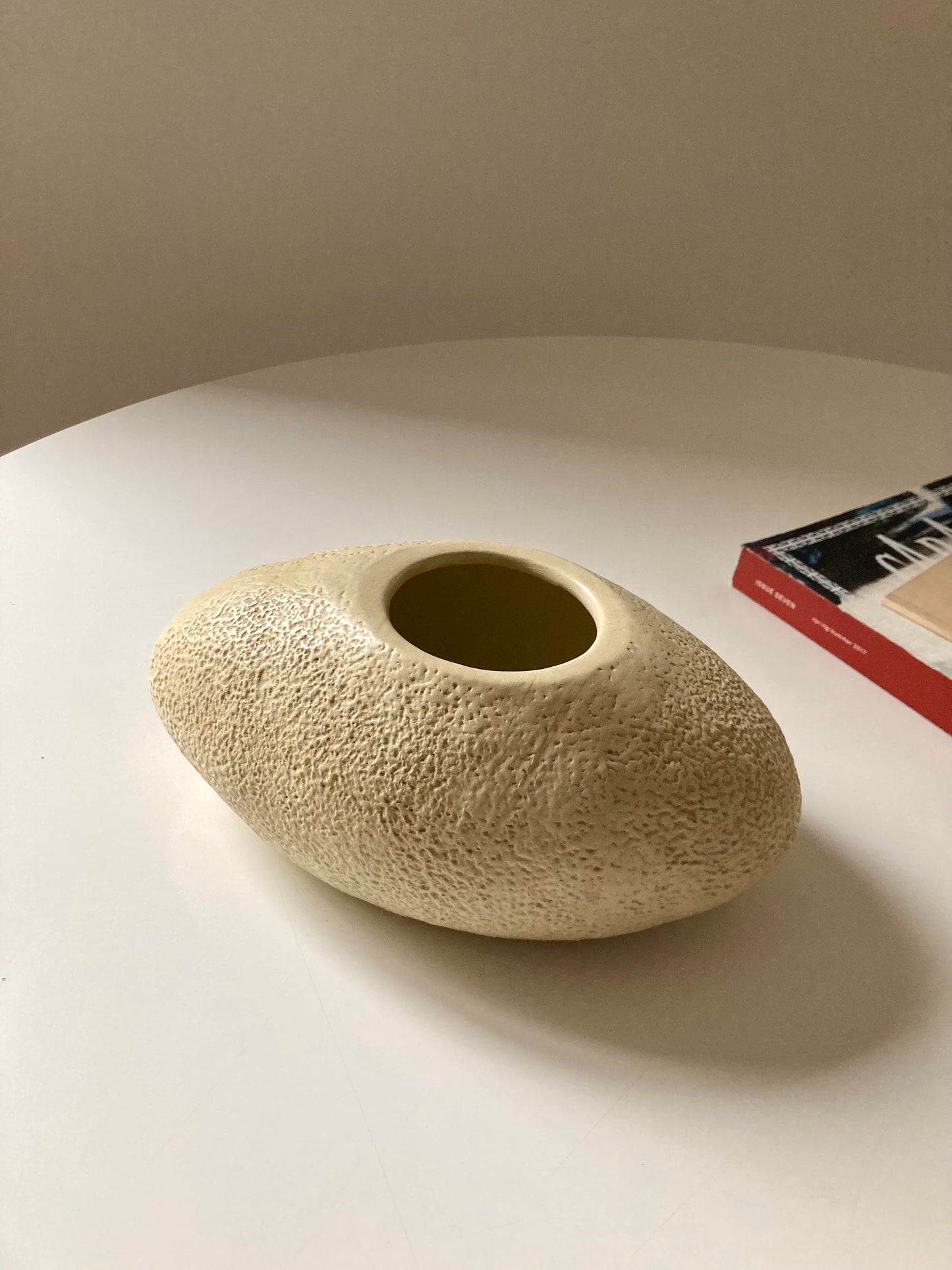 Oval vase with rough texture