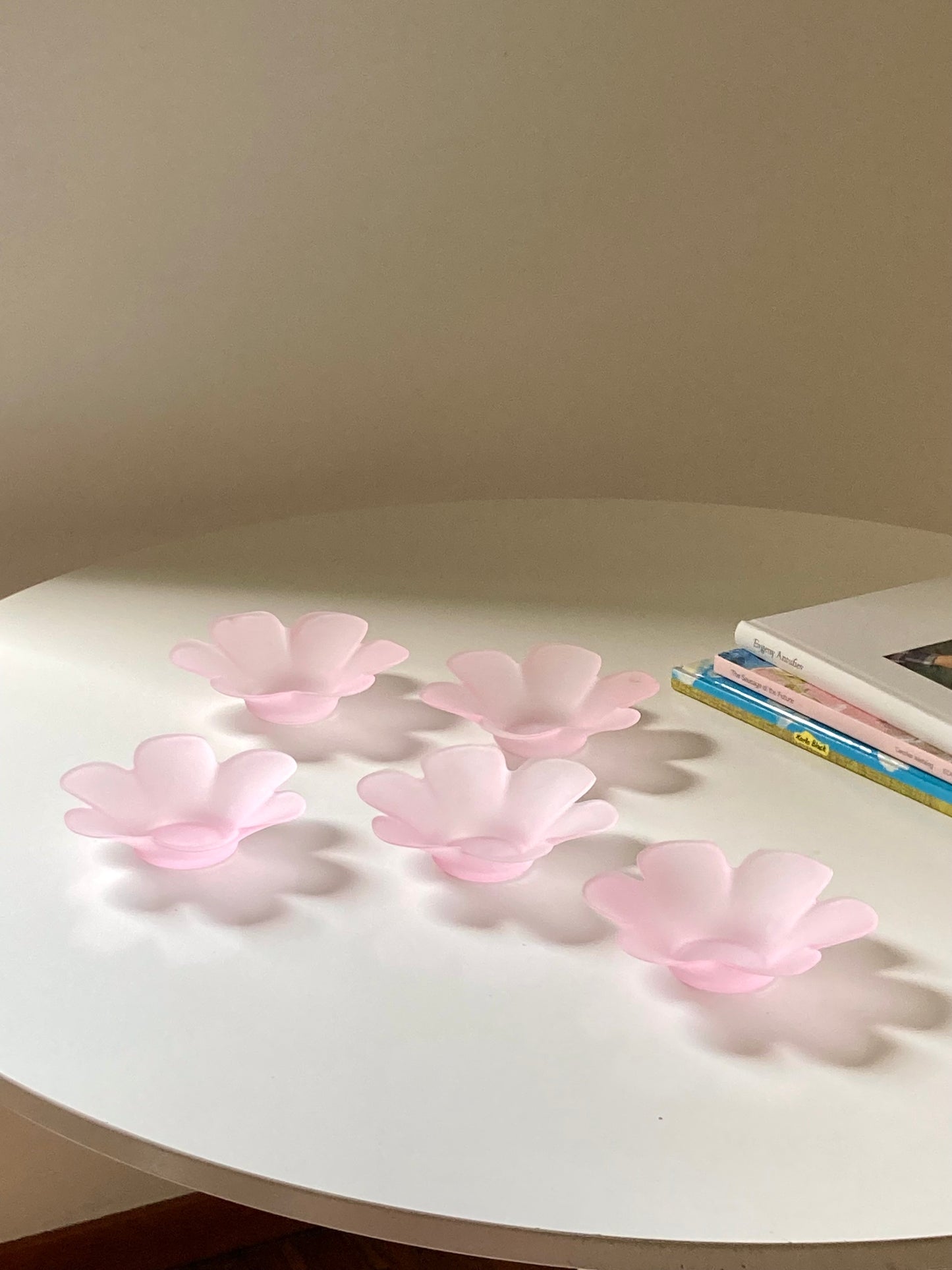 Pink glass flower-shaped bowls