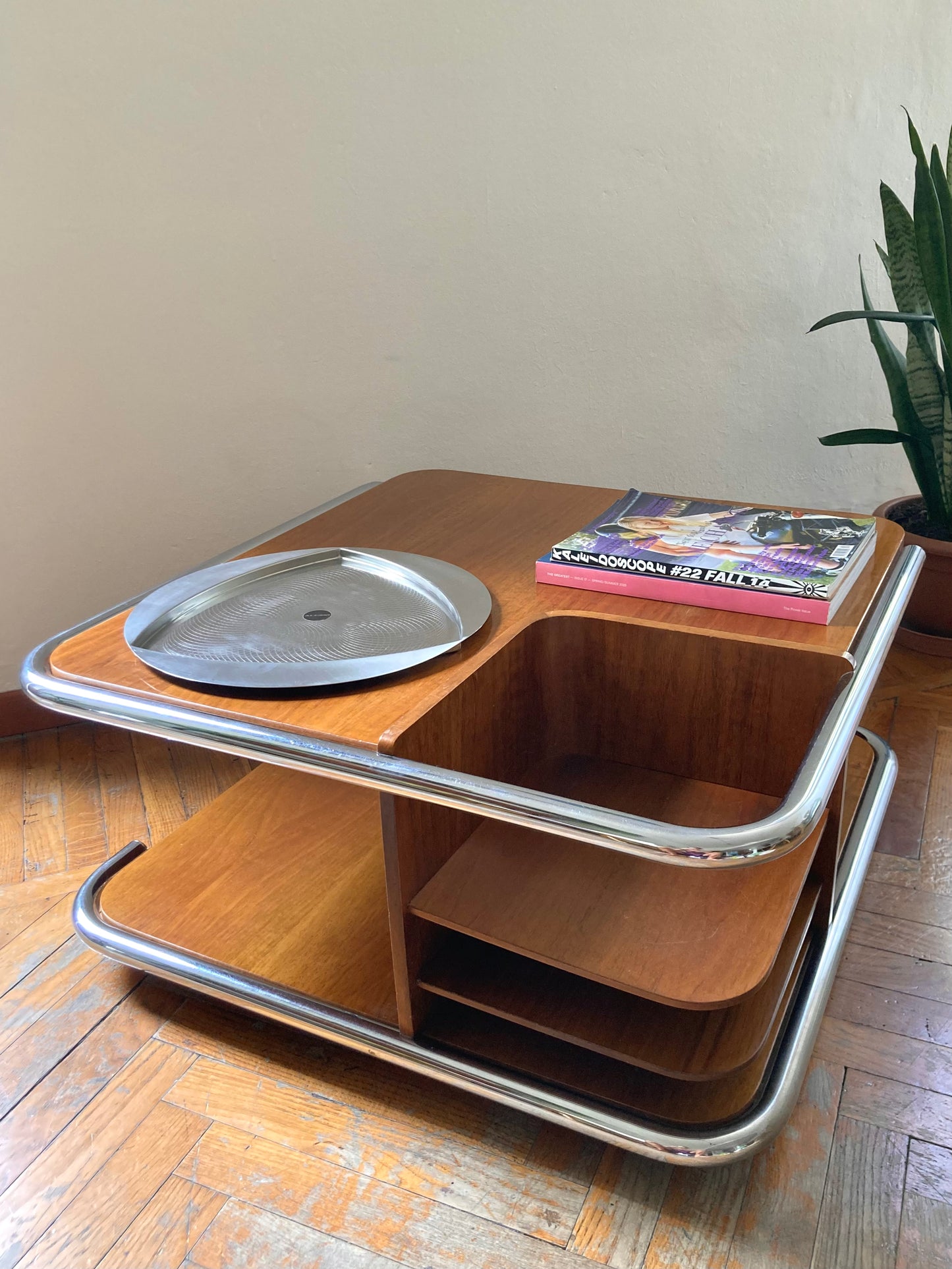 Square wooden coffee table with chromed profile