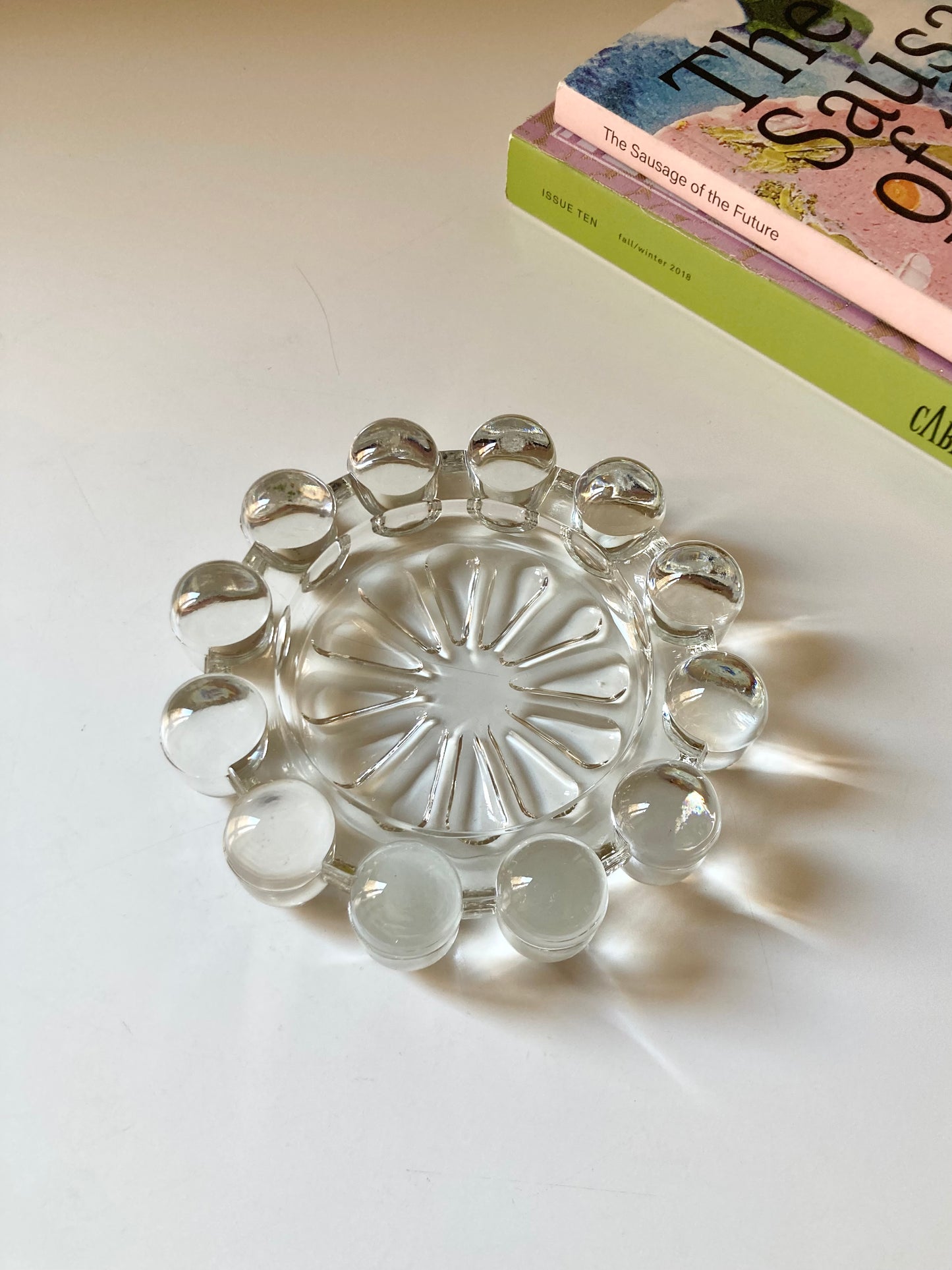 Transparent glass saucer