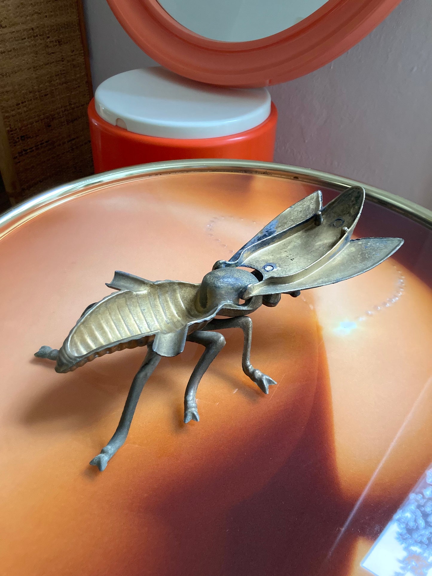 1950s insect ashtray in brass