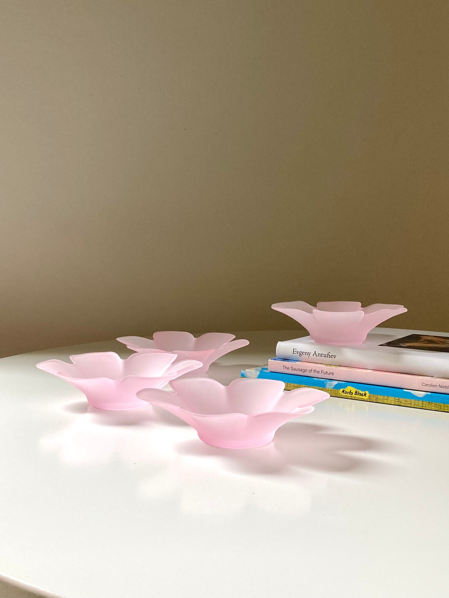 Pink glass flower-shaped bowls