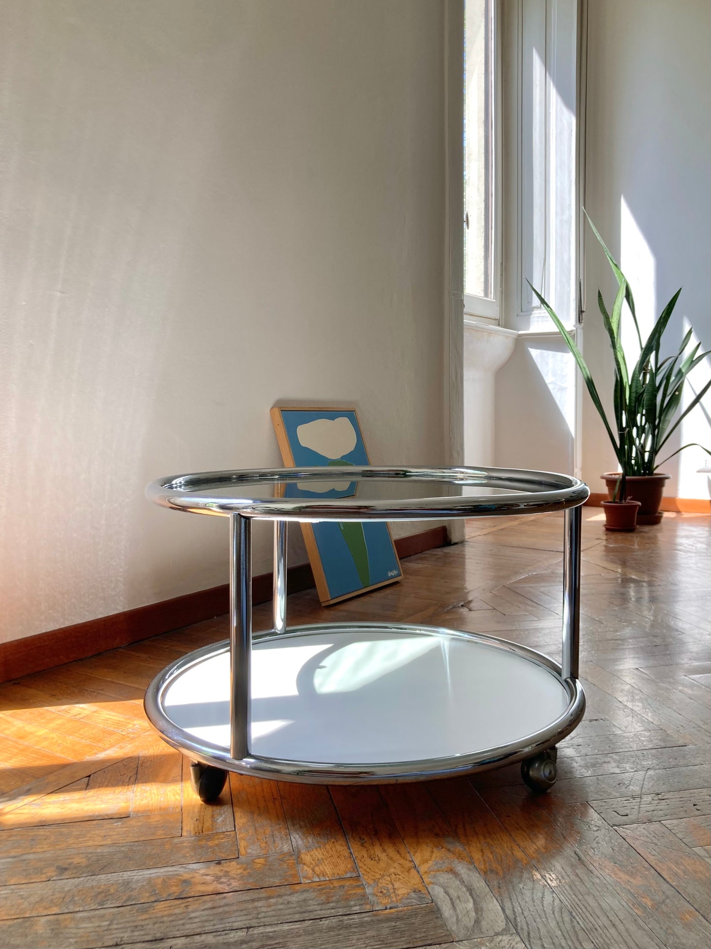 Vintage round coffee table with chrome profiles