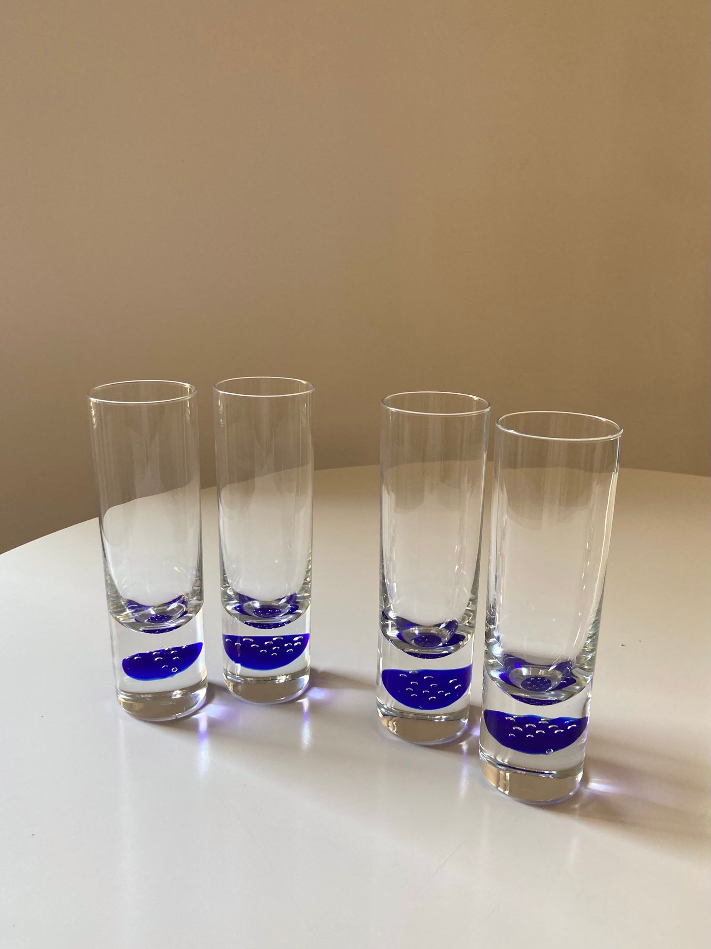 Set of 4 Murano glasses with blue base