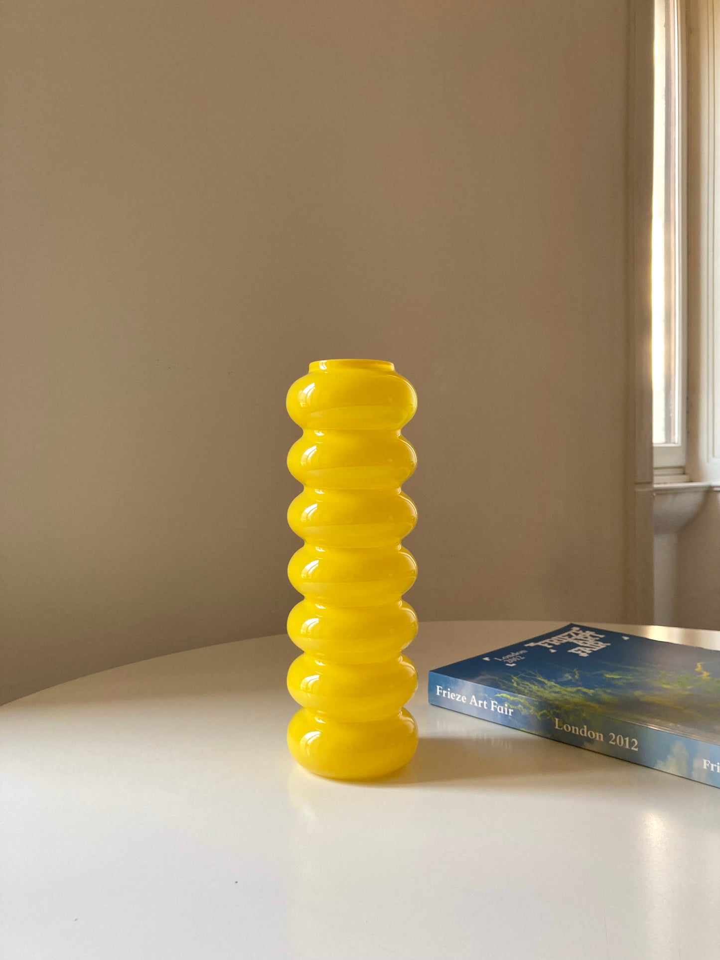 Solstrale yellow vase by Anne Nilsson