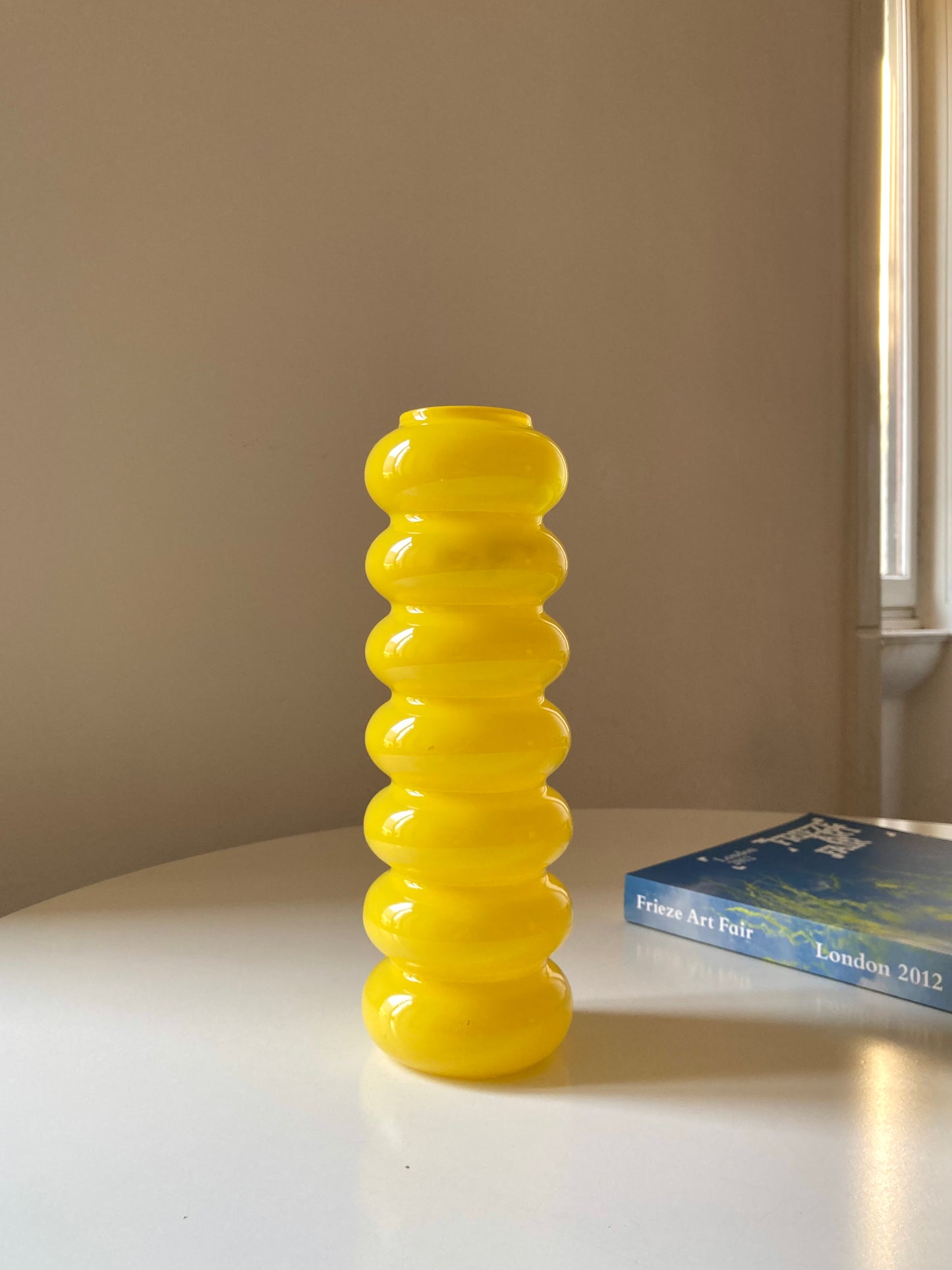 Solstrale yellow vase by Anne Nilsson