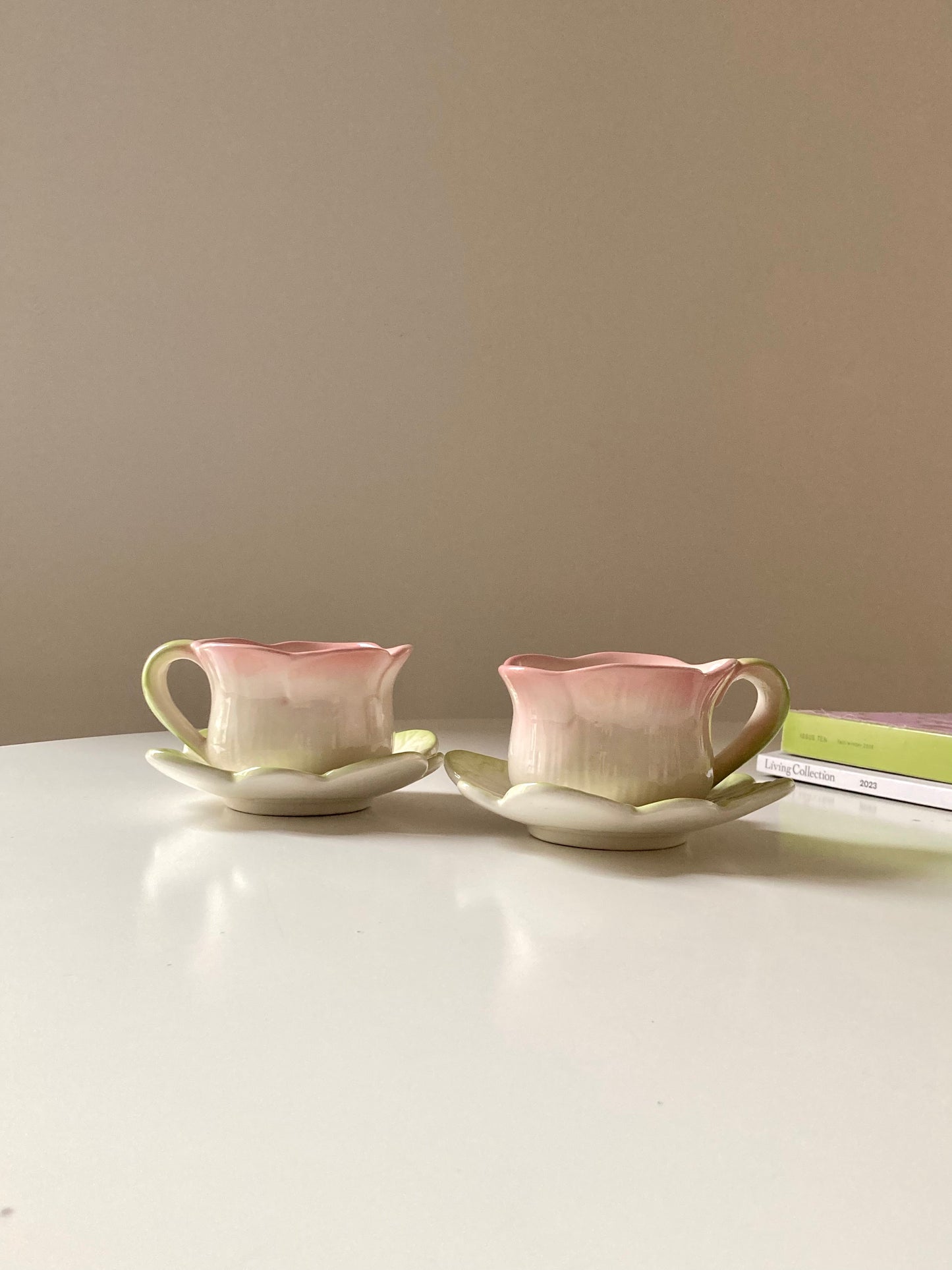 Pair of teacups with sugar bowl