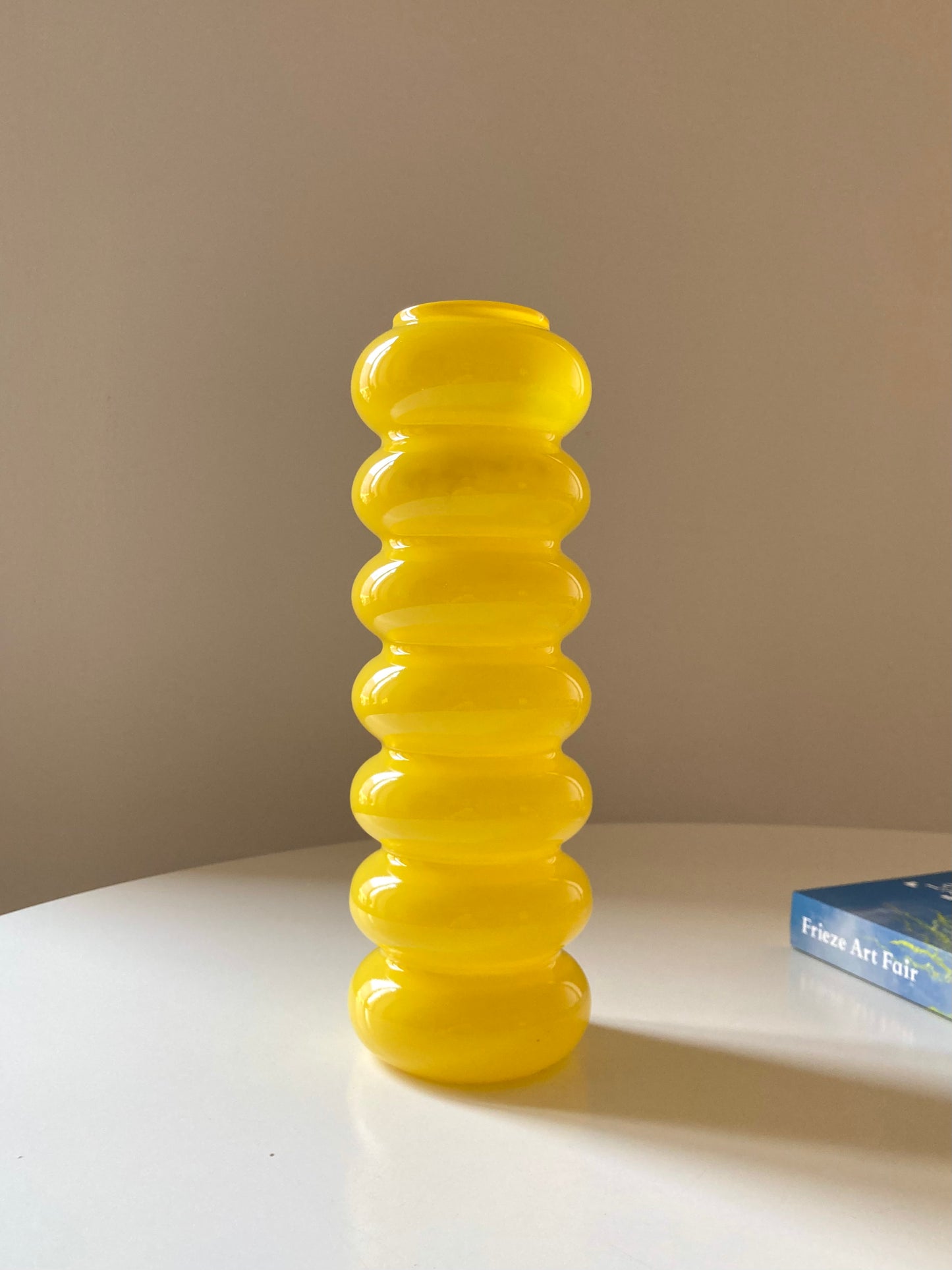 Solstrale yellow vase by Anne Nilsson