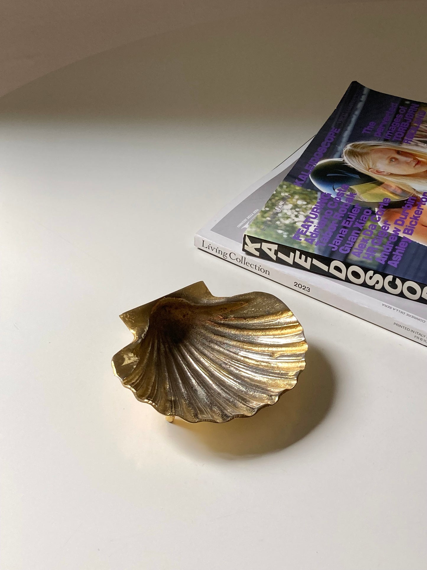 Golden shell-shaped ashtray