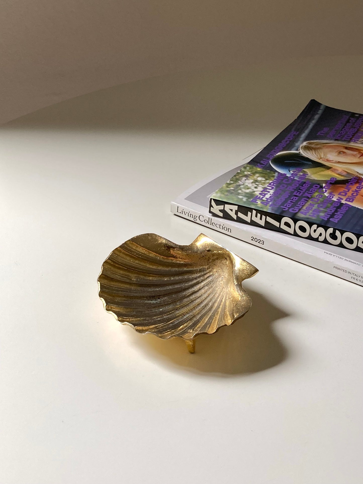 Golden shell-shaped ashtray