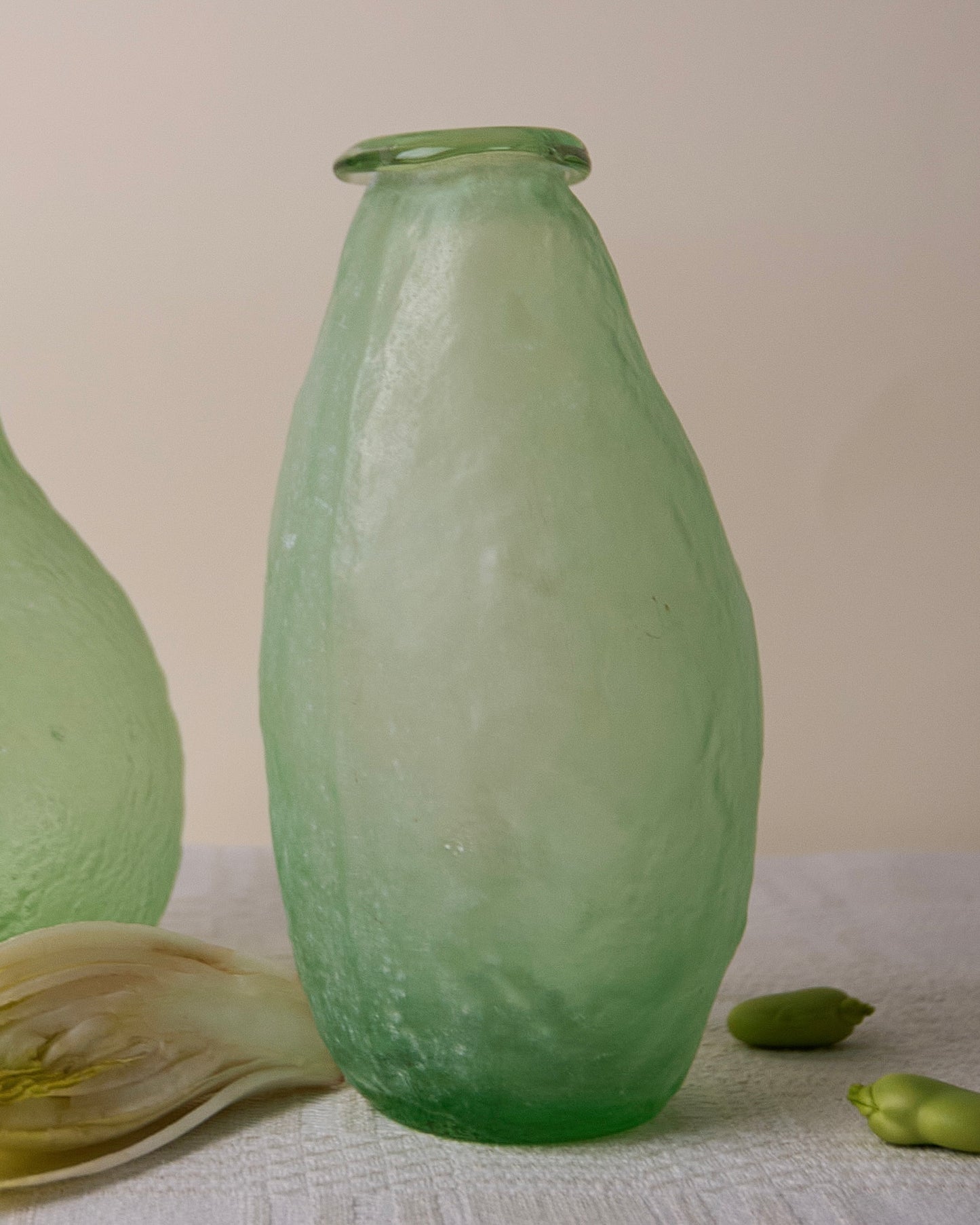 Trio asymmetric vases in green glass