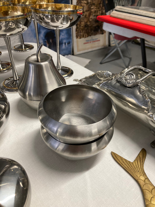 Couple of metal dessert bowls